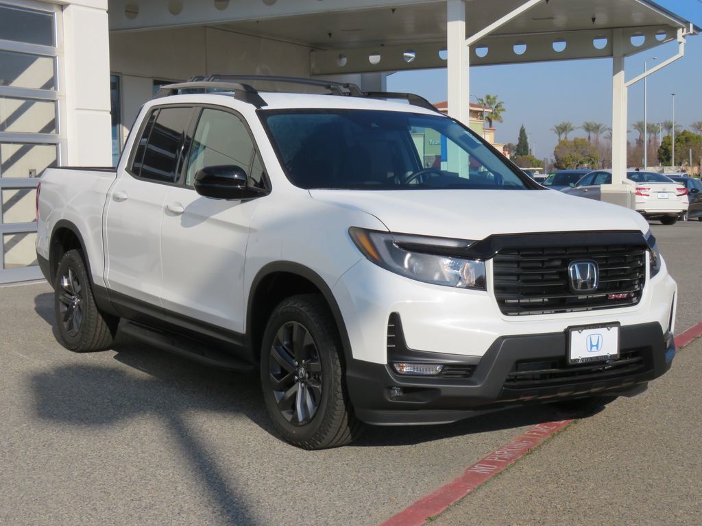 https://cdn.ebizautos.media/new-2023-honda-ridgeline-sportawd-8487-22082988-3-1024.jpg