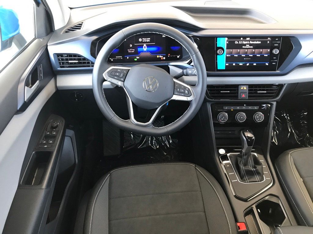 2023 New Volkswagen Taos SE FWD at PenskeCars.com Serving Bloomfield Hills,  MI, IID 22068304