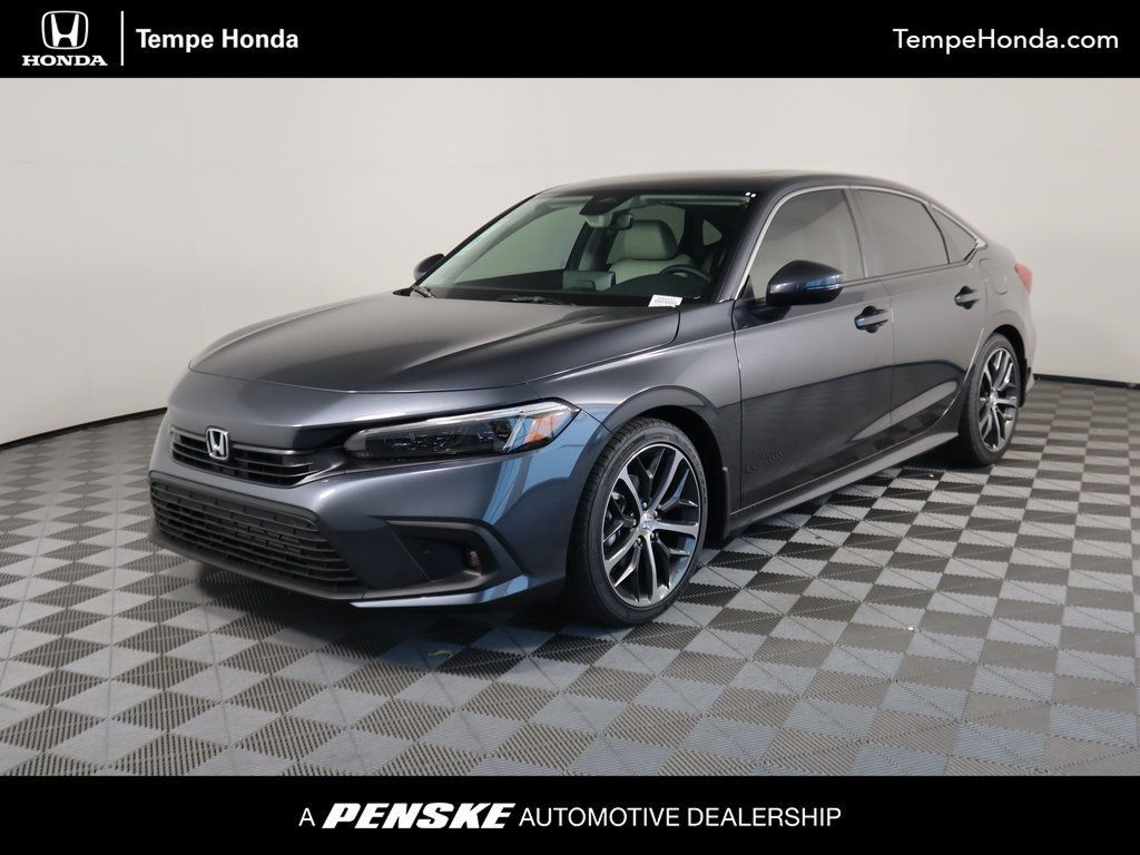 2025 New Honda Civic Sedan Touring CVT at Serving