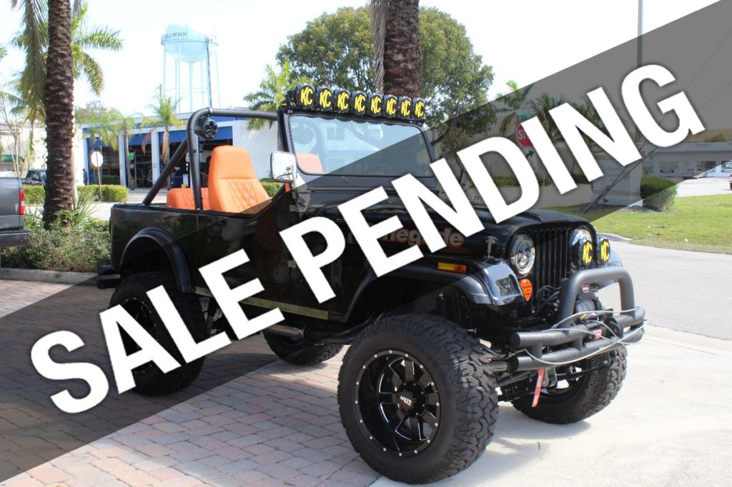 1978 Jeep CJ7 1978  CJ7 RESTOMODE 4WD CONVERTIBLE 350 AUTO - 21296574 | Video 1