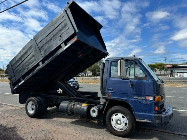 1995 GMC 4000 12 FOOT SOLID DUMP TRUCK 3 SECTION TAILGATE WILL GET THE JOB DONE WITH EASE - 22604266 - 1