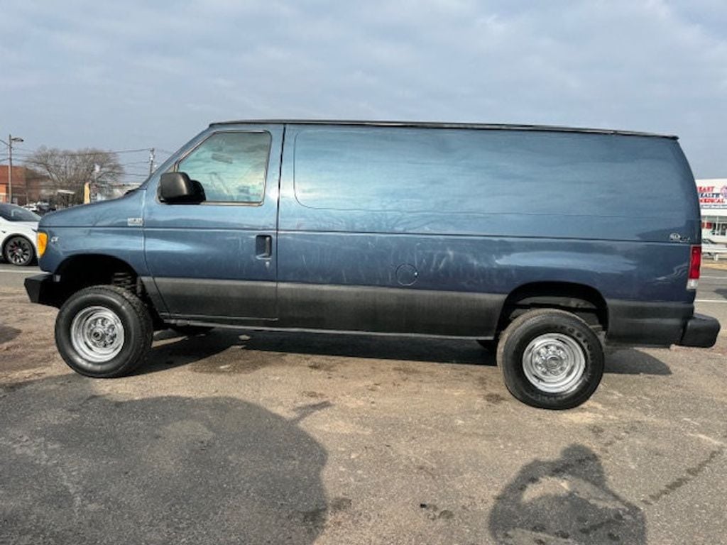 1997 Ford QUIGLEY FOUR WHEEL DRIVE E250 VAN MULTIPLE USES - 22276243 - 9
