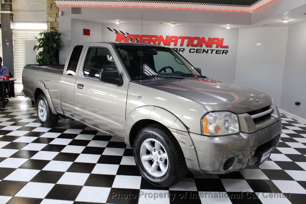2004 Nissan Frontier 2WD XE King Cab 2WD - 22447801 - 0