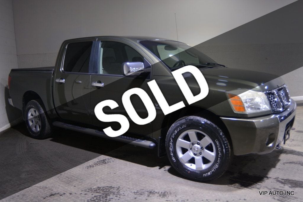 2004 Nissan Titan LE Crew Cab 4WD - 22545779 - 0