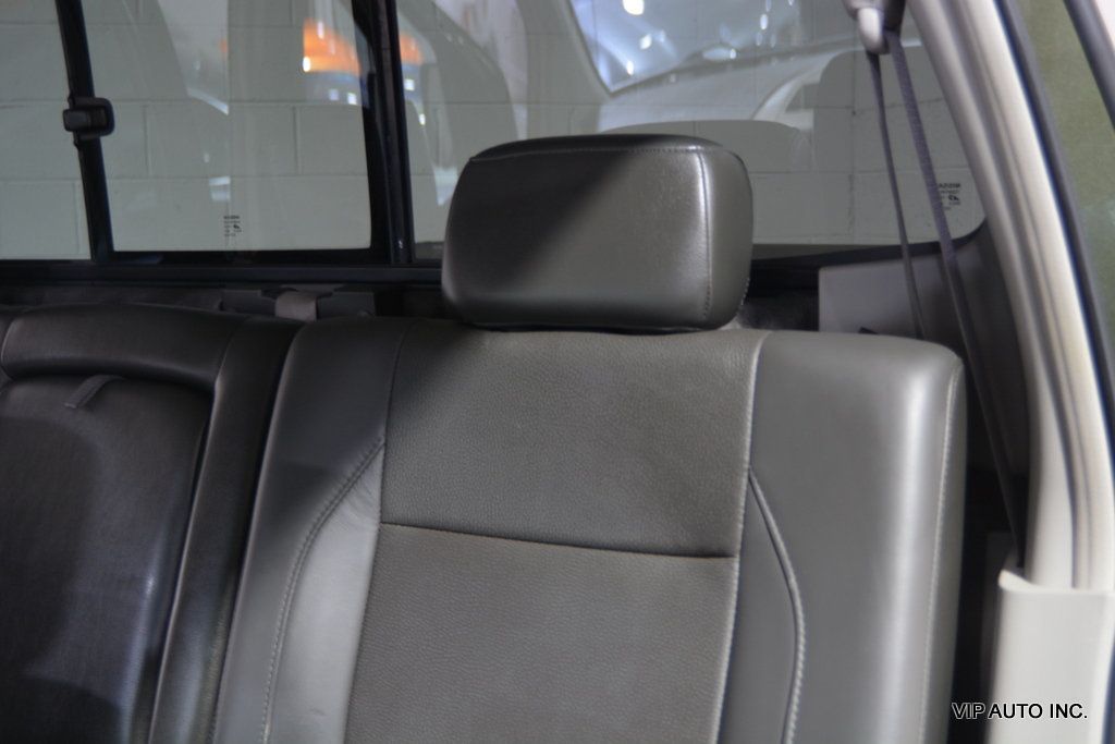 2004 Nissan Titan LE Crew Cab 4WD - 22545779 - 22