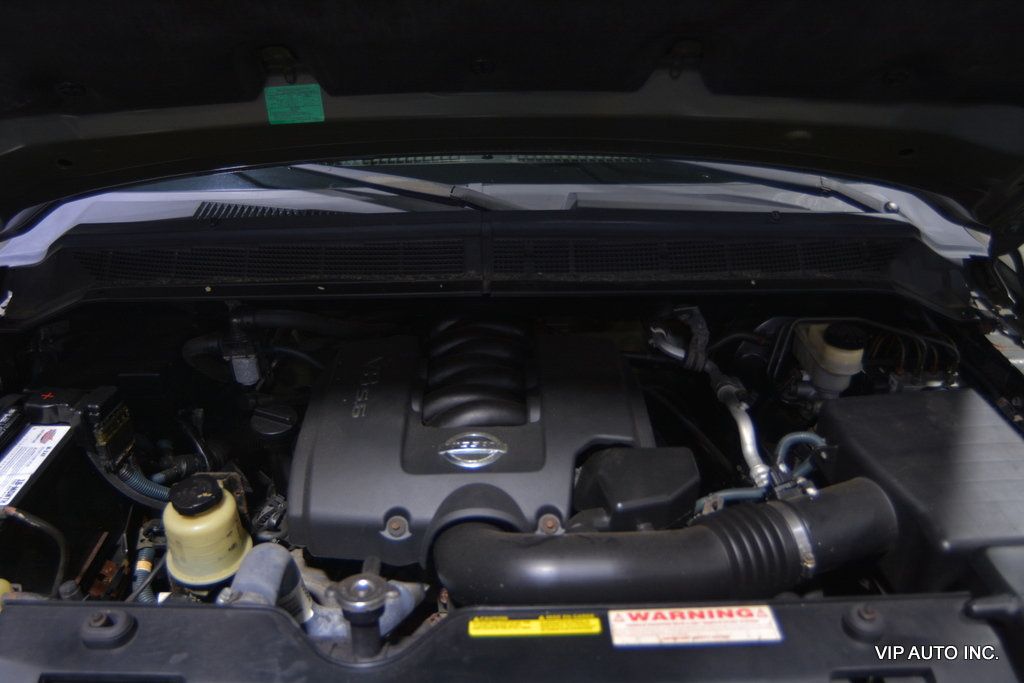 2004 Nissan Titan LE Crew Cab 4WD - 22545779 - 28