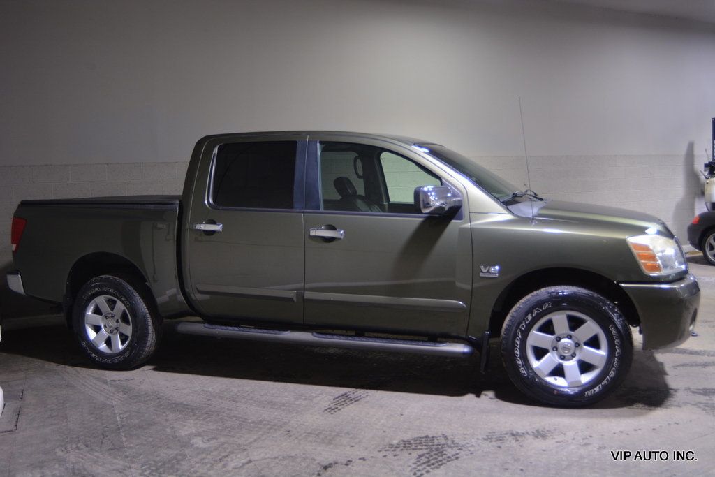 2004 Nissan Titan LE Crew Cab 4WD - 22545779 - 29