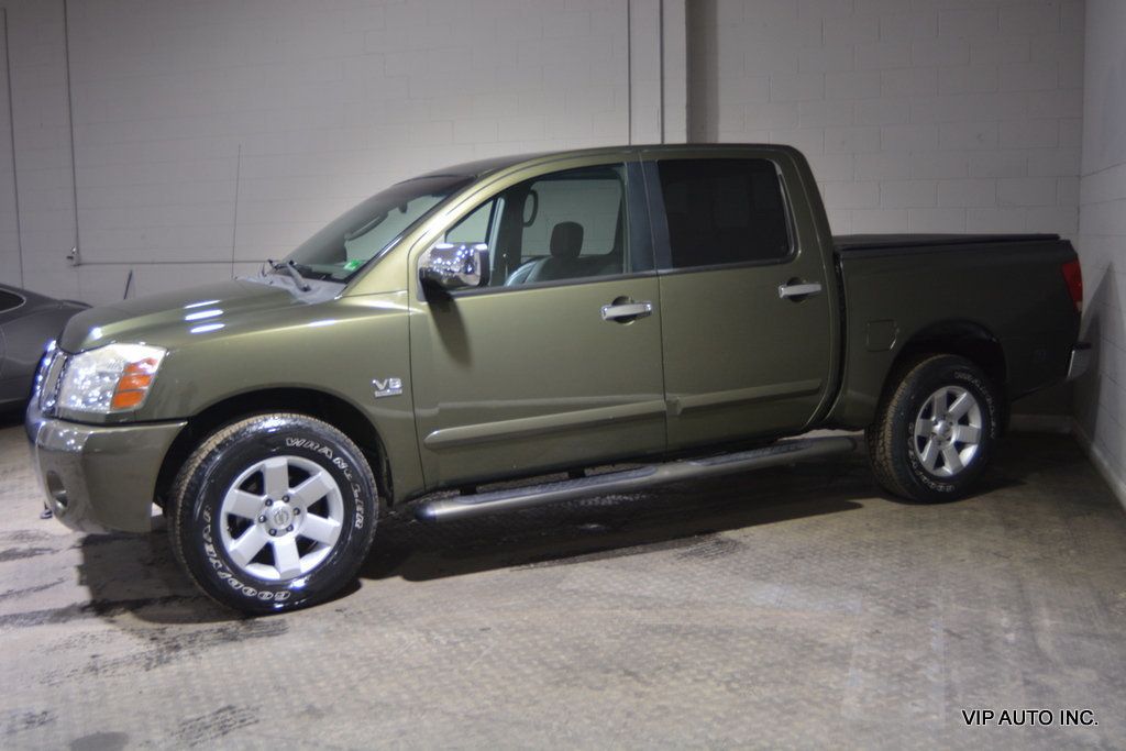 2004 Nissan Titan LE Crew Cab 4WD - 22545779 - 30