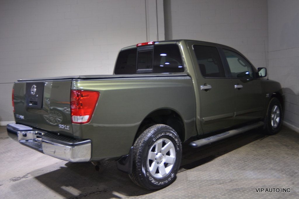 2004 Nissan Titan LE Crew Cab 4WD - 22545779 - 32