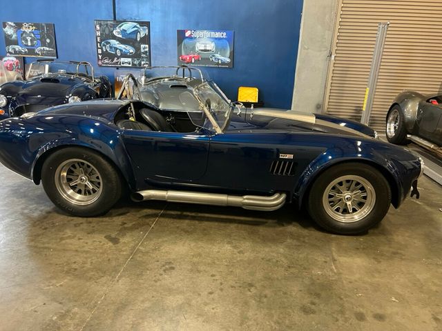 90’ｓ CHAMPION AUTO チャンプマン オート ビンテージ PVC 427R-Powered Kirkham Motorsports 289 FIA for sale on BaT