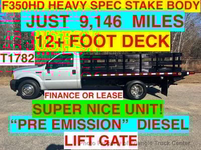 2006 Ford F350 FLATBED STAKE BODY 12+ FOOT JUST 9k MILES!