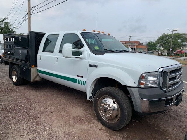 2006 Ford F550 SD STAKE BODY FLATBED CREW CAB SEVERAL IN STOCK - 22028693 - 0