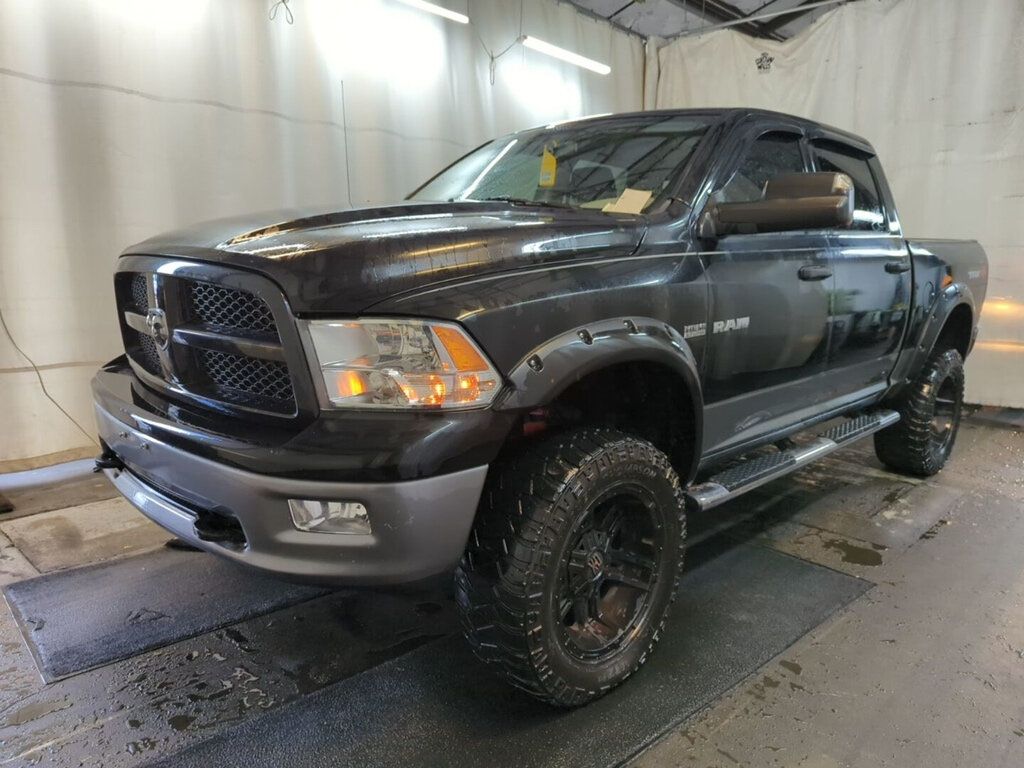 2009 Dodge Ram 1500 4WD Crew Cab 140.5" TRX - 22605364 - 0