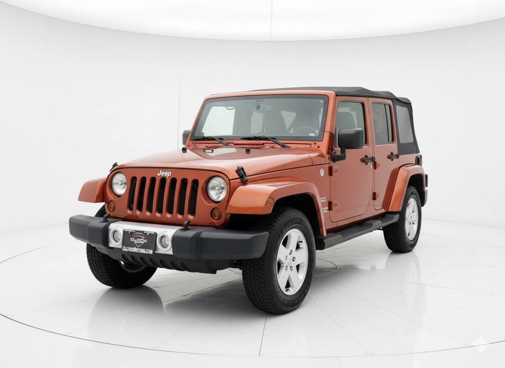 2009 Jeep Wrangler Unlimited Sunburst Orange - Clean Title - Dual Top Group - Well Maintained - 22936445 - 1