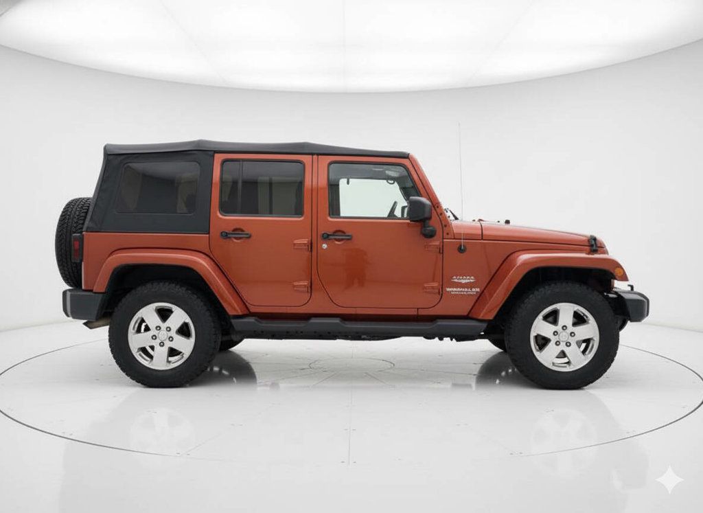 2009 Jeep Wrangler Unlimited Sunburst Orange - Clean Title - Dual Top Group - Well Maintained - 22936445 - 4