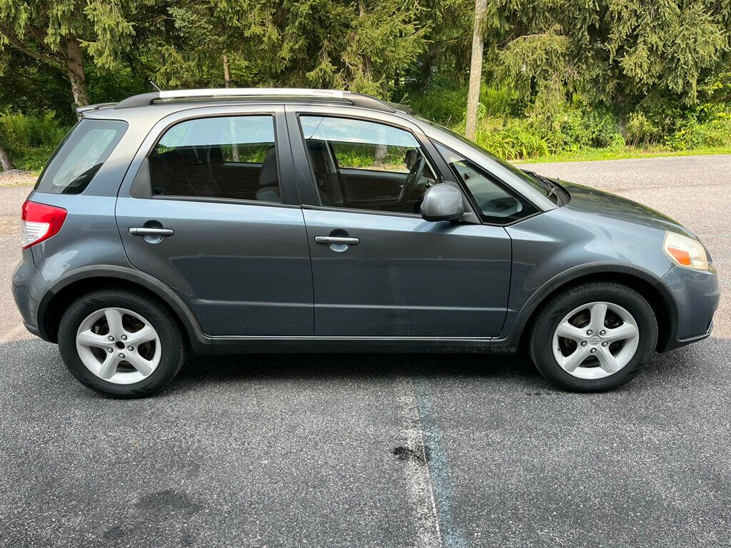2009 Suzuki SX4 SX4 Touring Shiftable All Wheel Drive - 23042710 - 1