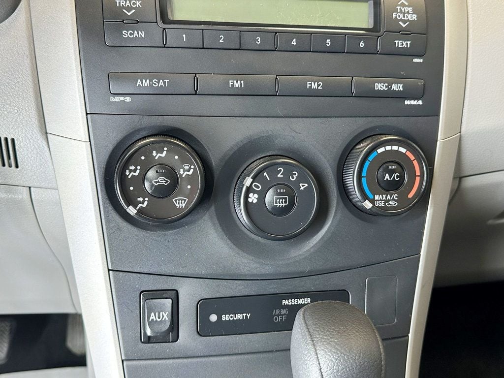 2009 Toyota Corolla 4dr Sedan Automatic LE - 23081217 - 25
