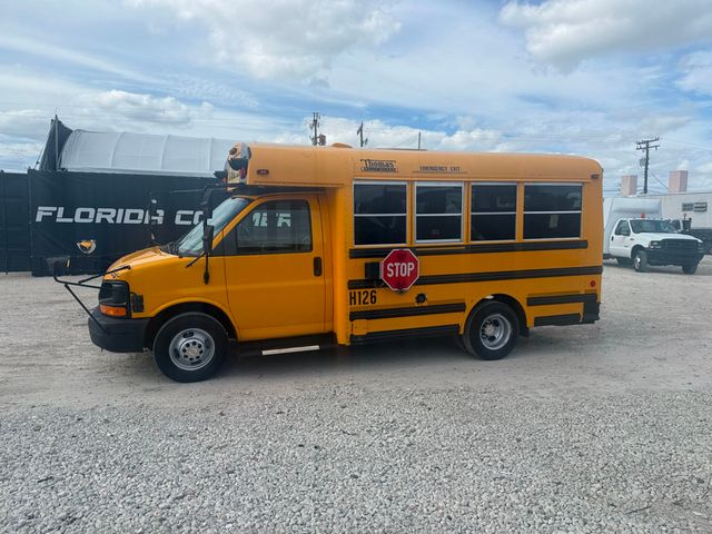 2010 Chevrolet Express 15 Passenger Shuttle Bus  - 22941653 - 1