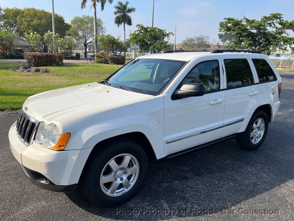 2010 Jeep Grand Cherokee Laredo 2WD - 22695884 - 0