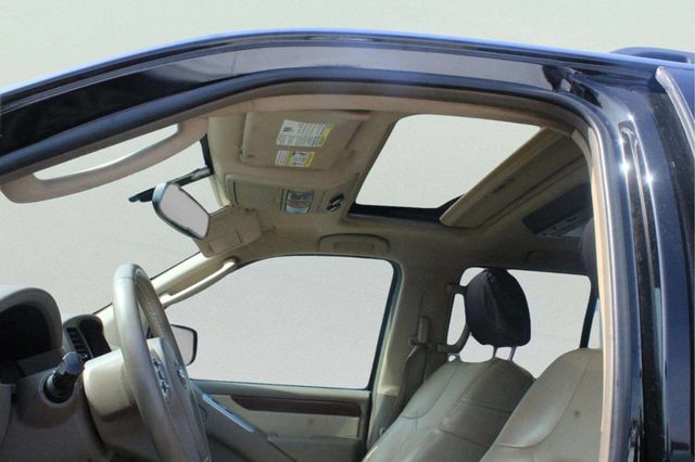 2010 Nissan Pathfinder 4WD 4dr V6 LE - 23004554 - 6