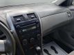 2010 Toyota Corolla 4dr Sedan Automatic LE - 23011854 - 25