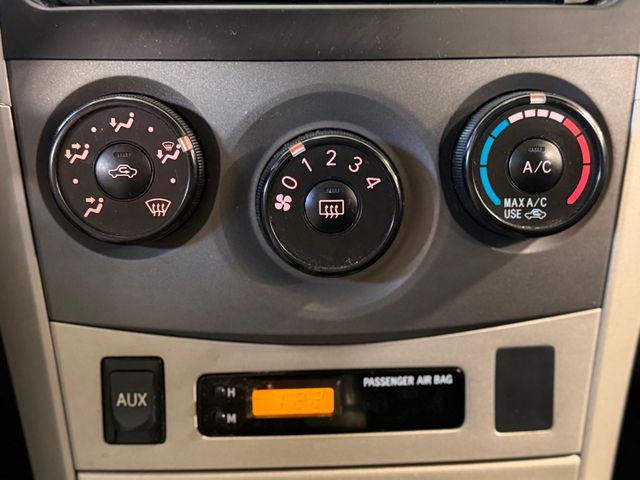 2010 Toyota Corolla 4dr Sedan Manual - 22971216 - 27