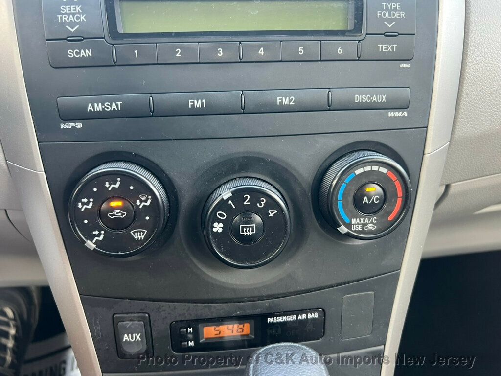 2010 Toyota Corolla LE photo 23