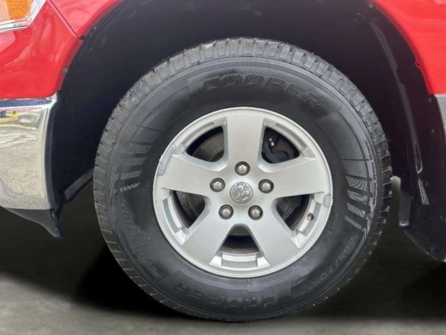 2011 Dodge Ram 1500 SLT 4x4 4dr Quad Cab 6.3 ft. SB Pickup - 22964800 - 28