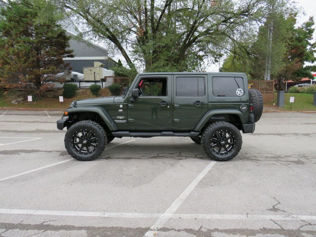 2011 Jeep Wrangler Unlimited 4WD 4dr Sahara - 22657468 - 0