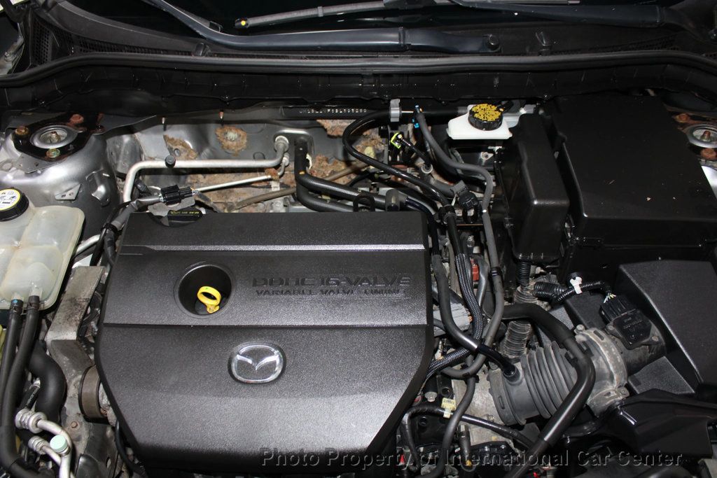 2011 Mazda Mazda3 4dr Sedan Manual i Touring - 22921847 - 27