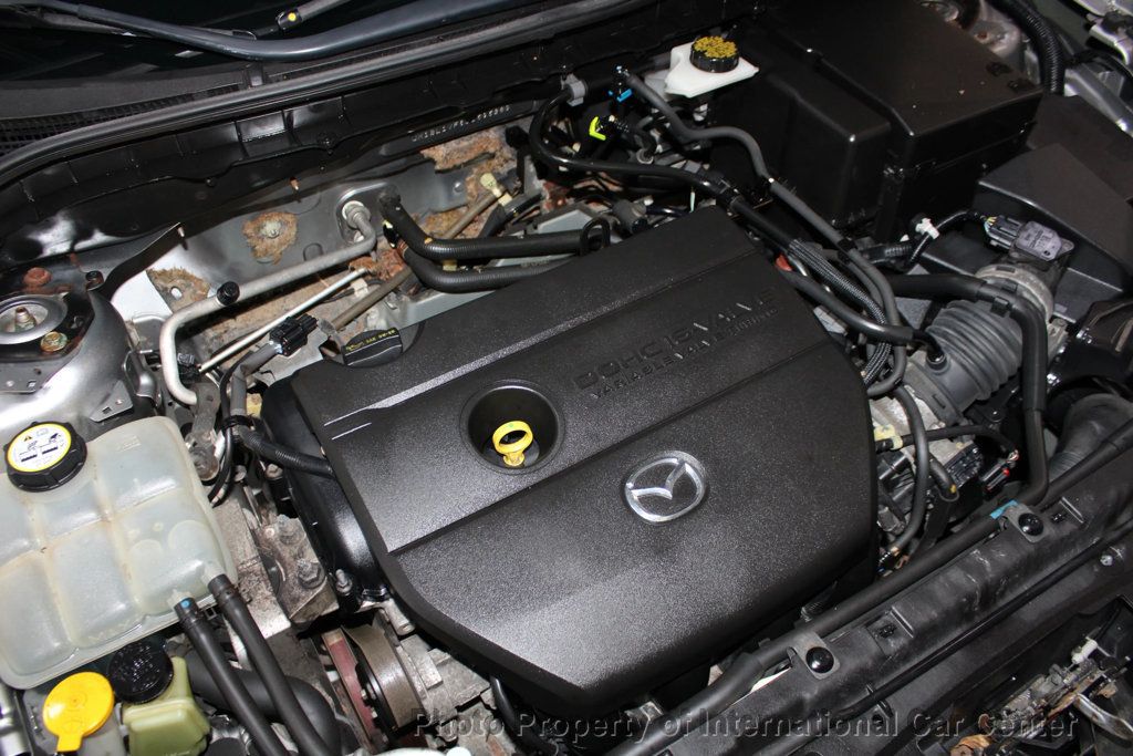 2011 Mazda Mazda3 4dr Sedan Manual i Touring - 22921847 - 28