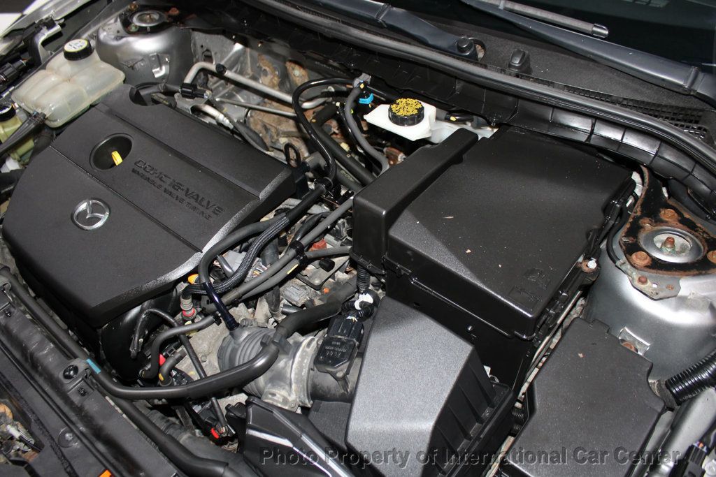 2011 Mazda Mazda3 4dr Sedan Manual i Touring - 22921847 - 29