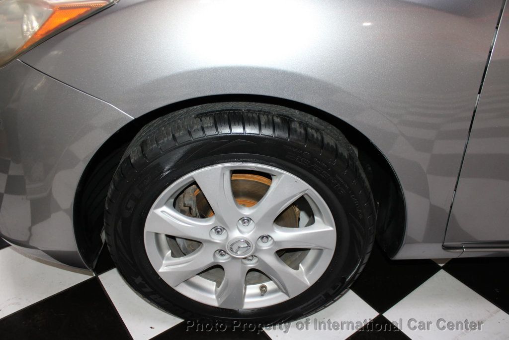 2011 Mazda Mazda3 4dr Sedan Manual i Touring - 22921847 - 31