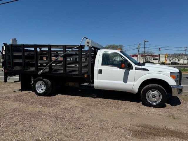 2012 Ford F350 SD 13 FT FLATBED STAKE BODY WITH LIFTGATE 24,000 MILES - 22389209 - 4