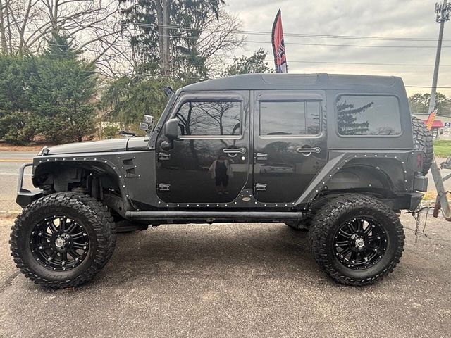 2012 Jeep Wrangler Unlimited 4WD 4dr Sahara - 22888604 - 24