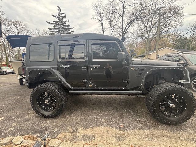 2012 Jeep Wrangler Unlimited 4WD 4dr Sahara - 22888604 - 26