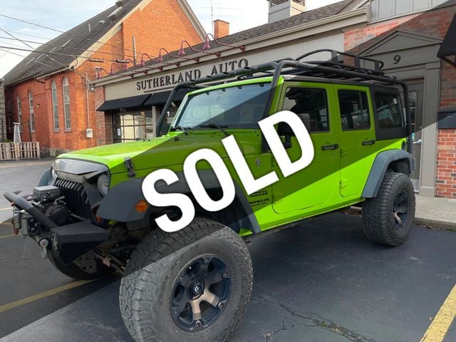 2012 Jeep Wrangler Unlimited 4WD 4dr Sport - 21841396 - 0