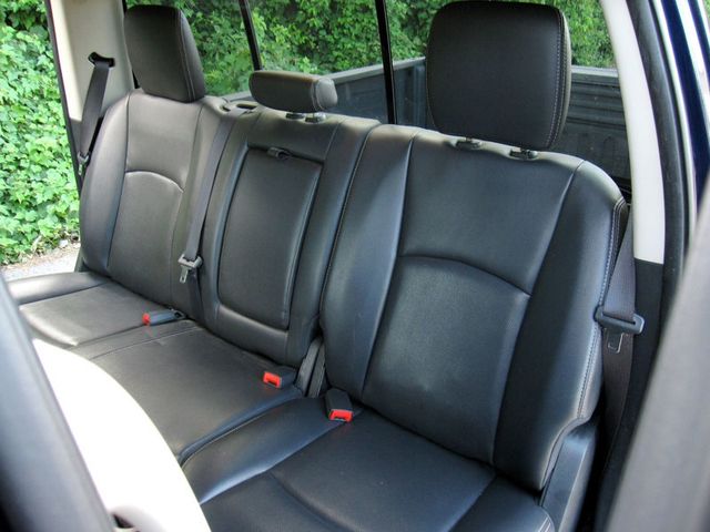 2012 Ram 1500 4WD Crew Cab 140.5" Laramie - 22889638 - 26