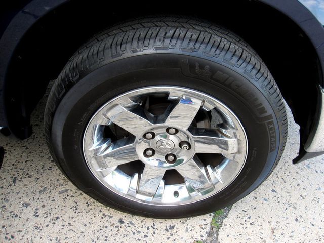 2012 Ram 1500 4WD Crew Cab 140.5" Laramie - 22889638 - 31