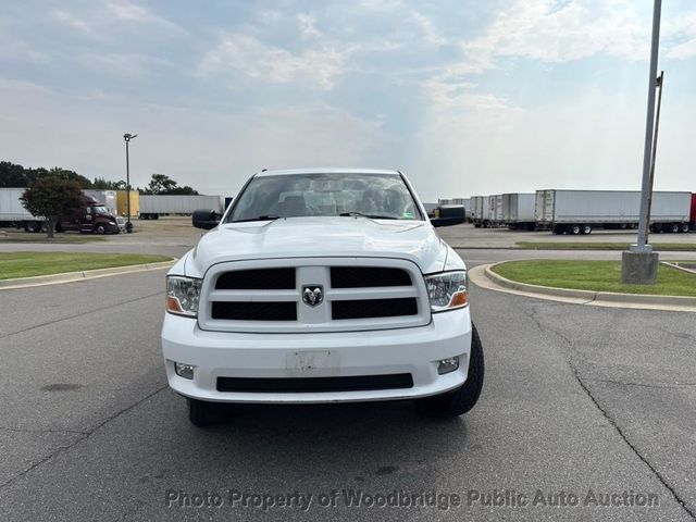 2012 Ram 1500 4WD Crew Cab 140.5" ST - 23094196 - 18