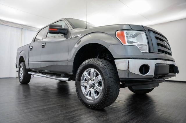 2013 Ford F-150 4WD SuperCrew 145" XLT - 23043078 - 27