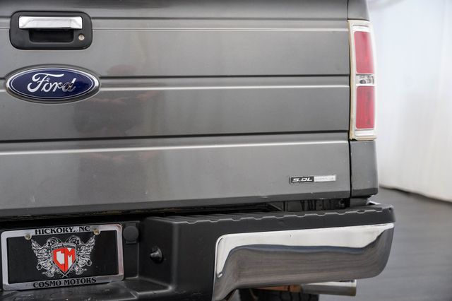 2013 Ford F-150 4WD SuperCrew 145" XLT - 23043078 - 38