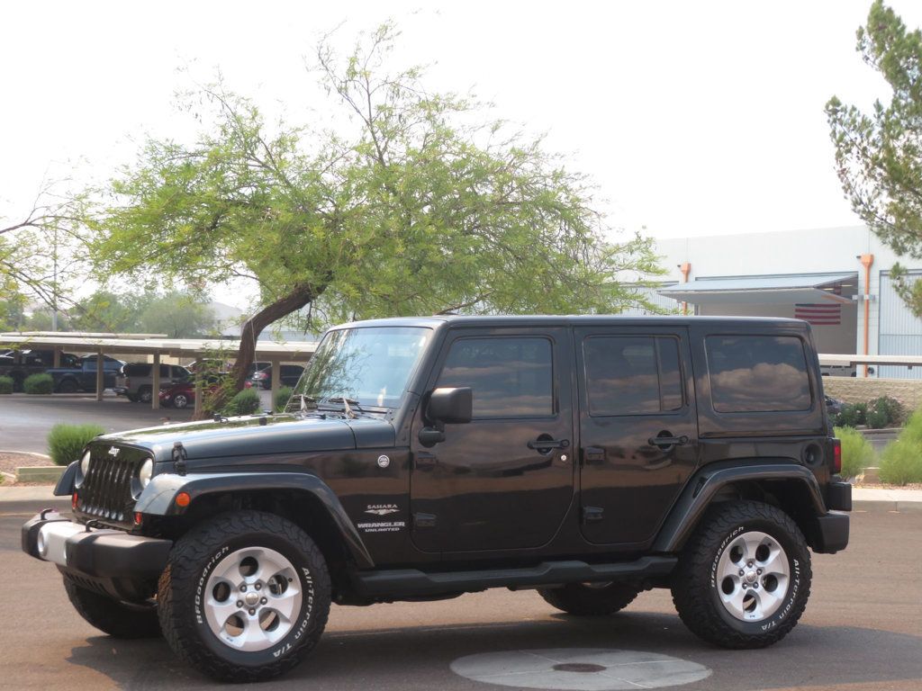 2013 Jeep Wrangler Unlimited 1OWNER JEEP WRANGLER 4DOOR EXTAR CLEAN SAHARA AZ JEEP  - 23023549 | Video 1
