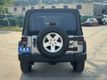 2013 Jeep Wrangler Unlimited 4WD 4dr Freedom Edition - 23065983 - 9