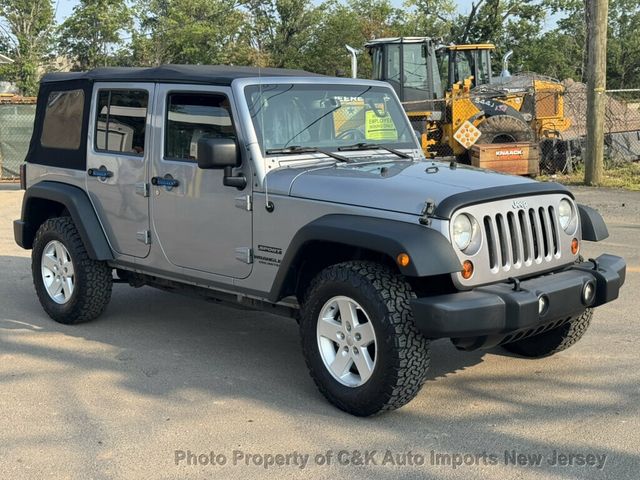 2013 Jeep Wrangler Unlimited 4WD 4dr Freedom Edition - 23065983 - 1