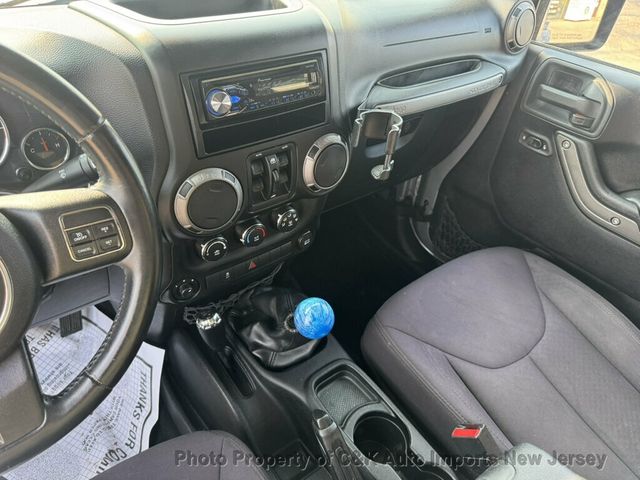 2013 Jeep Wrangler Unlimited 4WD 4dr Freedom Edition - 23065983 - 21