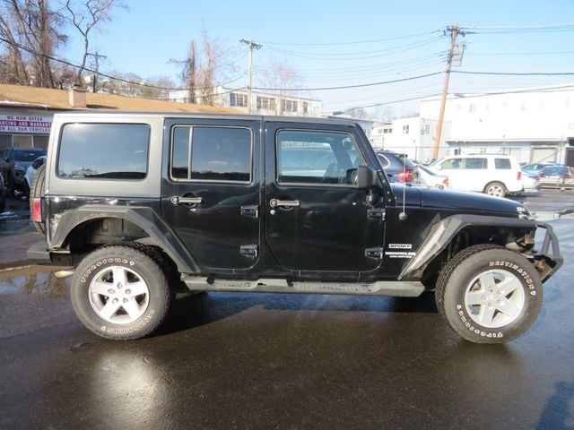 2013 Jeep Wrangler Unlimited 4WD 4dr Freedom Edition(clear title) - 22961366 - 3