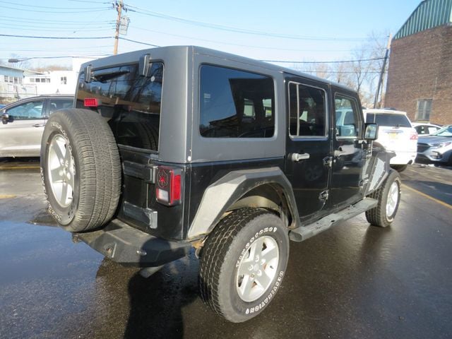 2013 Jeep Wrangler Unlimited 4WD 4dr Freedom Edition(clear title) - 22961366 - 4