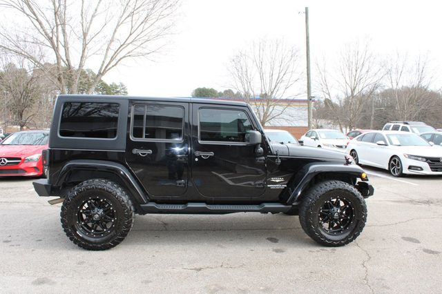 2013 Jeep Wrangler Unlimited 4WD 4dr Sahara - 22978320 - 11