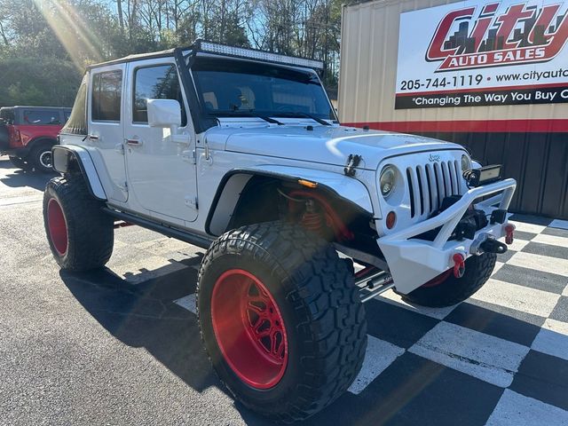 2013 Jeep Wrangler Unlimited 4WD 4dr Sahara - 22365556 - 0